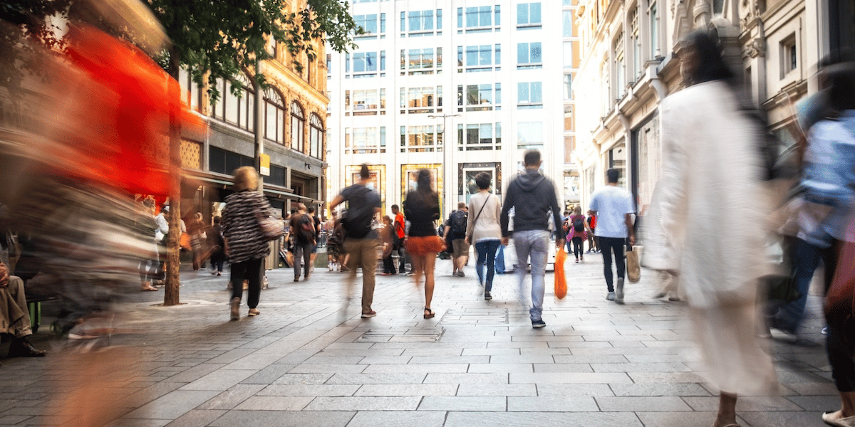 Shoppers making purchase decisions, illustrating insights from brand positioning research and consumer behavior analysis to align brands with audience mind states.