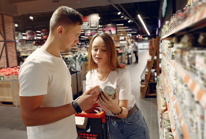 Customer selecting between competitive products demonstrating purchase decisions analyzed through qualitative and quantitative research