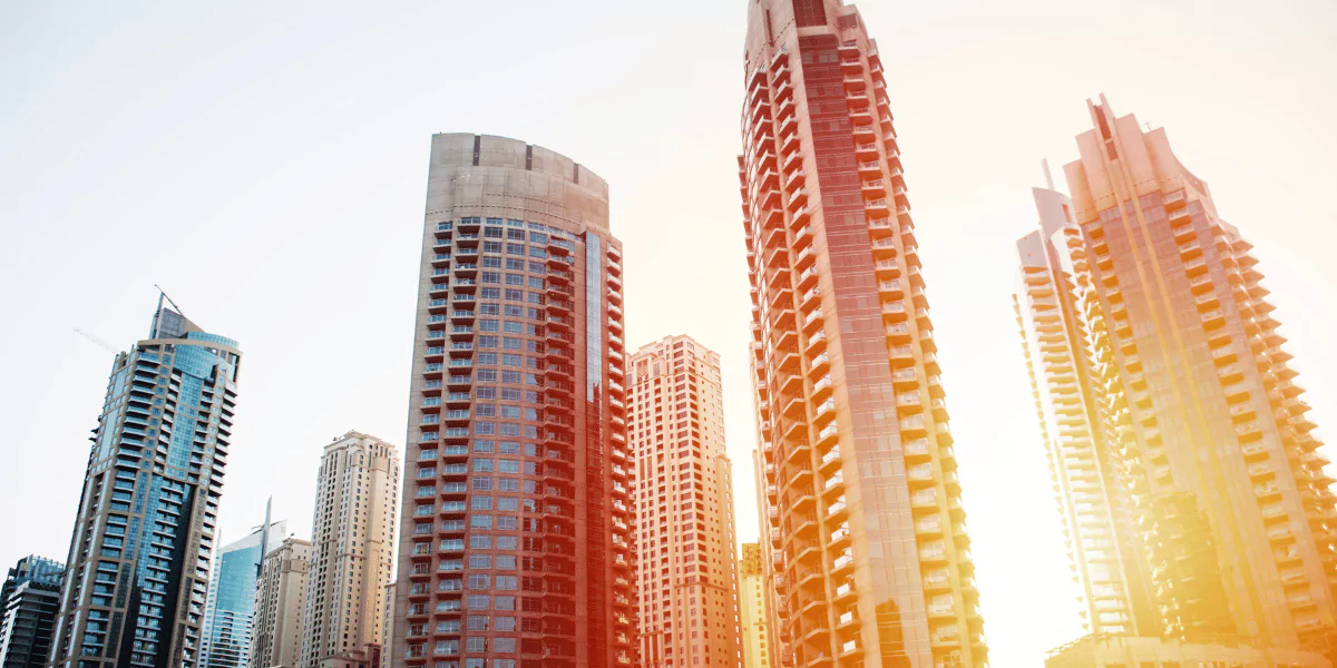 City skyline featuring large businesses, representing competitive dynamics and opportunities within a market size analysis.