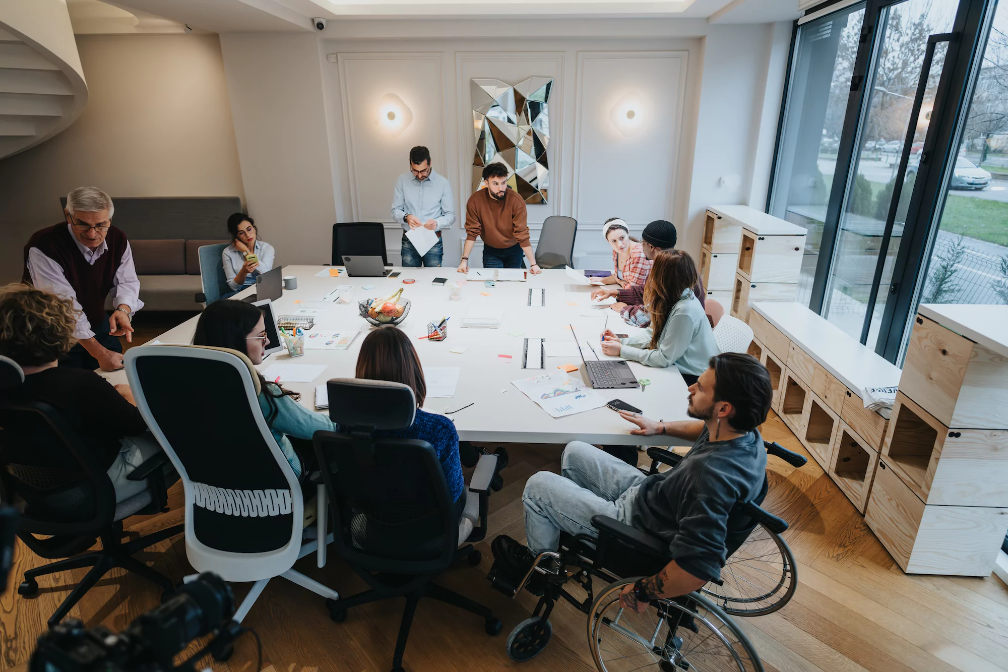 Board room of marketing professionals overlooking results from concept testing insights